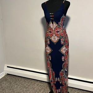Beautiful print dress with open back and splits size large